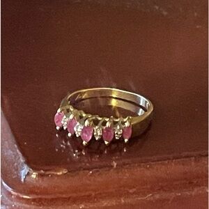 Gold Banded Ring With Staircase Stack of Pink gems